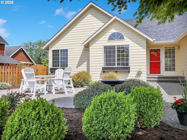 1689 Huckleberry Dr, Seaside, OR 97138 - rear view of house featuring a patio