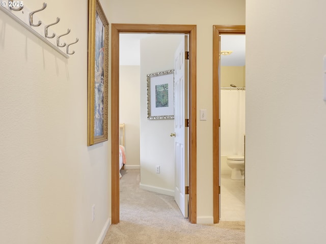 1689 Huckleberry Dr, Seaside, OR 97138 - hall featuring light carpet and baseboards