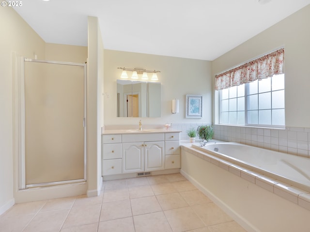 1689 Huckleberry Dr, Seaside, OR 97138 - bathroom with vanity, tile patterned floors, a stall shower, and a garden tub