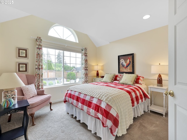 1689 Huckleberry Dr, Seaside, OR 97138 - carpeted bedroom with multiple windows, vaulted ceiling, baseboards, and recessed lighting