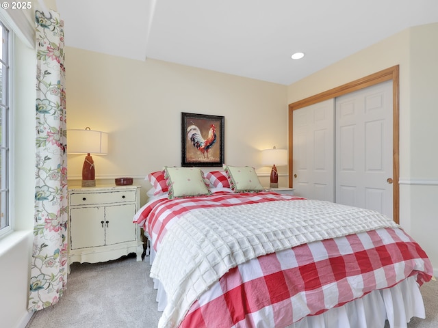 1689 Huckleberry Dr, Seaside, OR 97138 - bedroom with light carpet, a closet, and recessed lighting