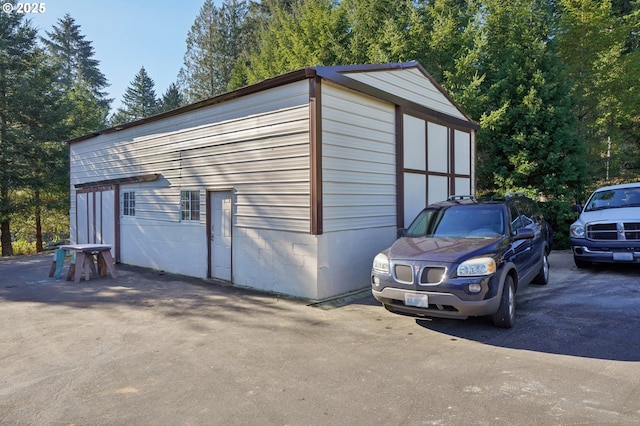 view of outbuilding with a garage