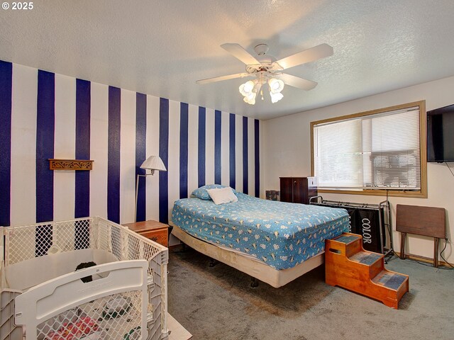 1313 NE 17th Ave, Battle Ground, WA 98604 - carpeted bedroom featuring a textured ceiling and ceiling fan