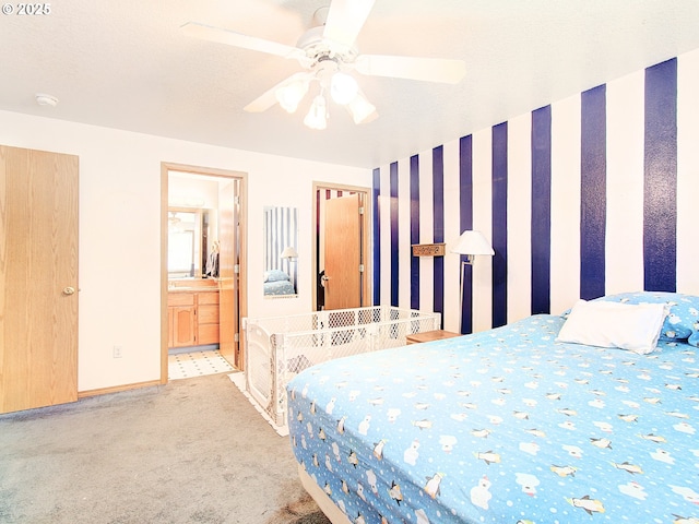 1313 NE 17th Ave, Battle Ground, WA 98604 - carpeted bedroom with ceiling fan and ensuite bathroom