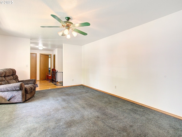 1313 NE 17th Ave, Battle Ground, WA 98604 - unfurnished living room featuring light colored carpet and ceiling fan