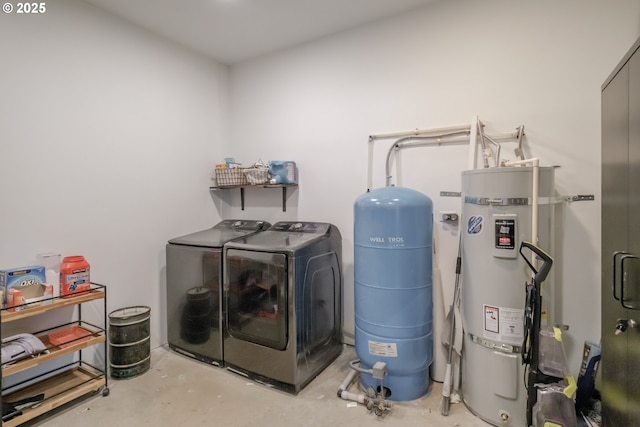 laundry area featuring laundry area, independent washer and dryer, and secured water heater