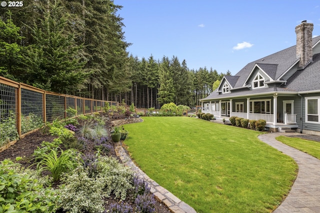 view of yard with a porch