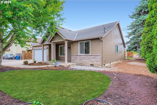 1080 Sage St, Silverton, OR 97381 - craftsman house featuring driveway, a garage, stone siding, and a shingled roof