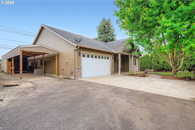 1080 Sage St, Silverton, OR 97381 - view of front of property featuring driveway, an attached garage, and a shingled roof