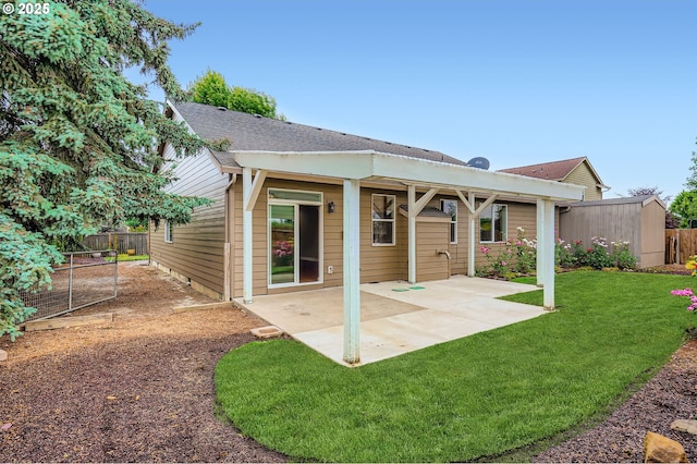 1080 Sage St, Silverton, OR 97381 - back of house featuring a patio and roof with shingles