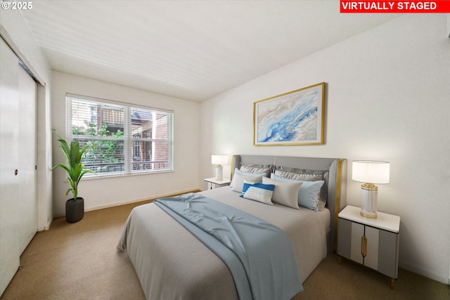 1500 SW Park Ave, Portland, OR 97201 - carpeted bedroom featuring baseboards and a closet