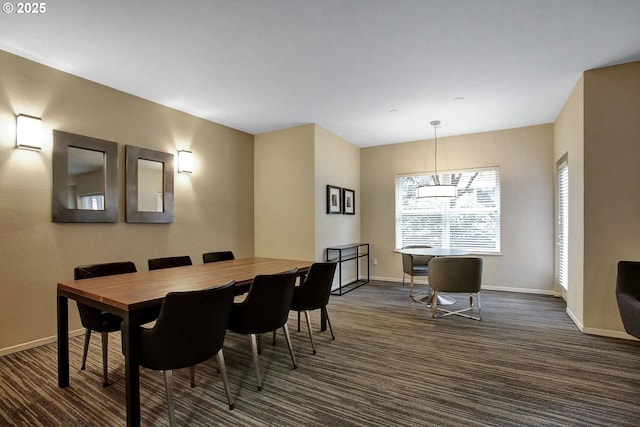 1500 SW Park Ave, Portland, OR 97201 - dining space featuring dark colored carpet and baseboards