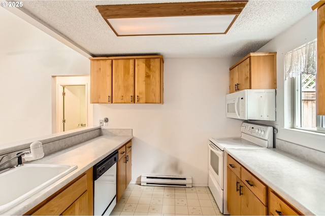 kitchen featuring white appliances, baseboard heating, a textured ceiling, light countertops, and a sink