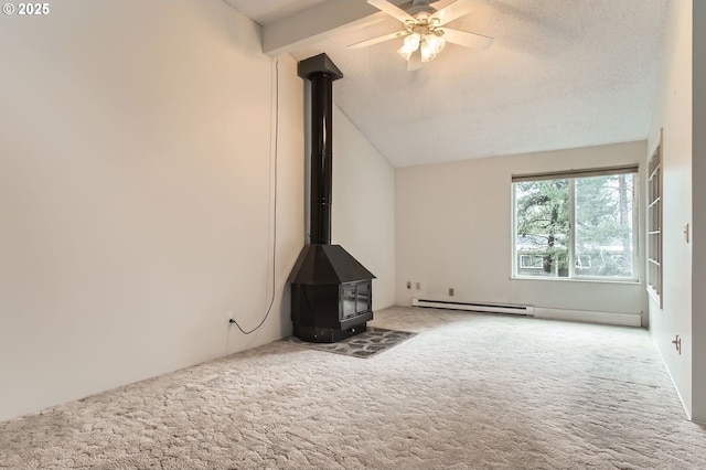 unfurnished living room featuring a baseboard radiator, lofted ceiling, a wood stove, carpet flooring, and ceiling fan