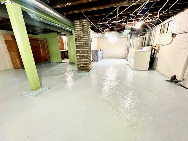 735 SE Spokane St, Portland, OR 97202 - unfinished basement featuring washer and dryer