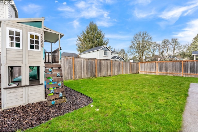 view of yard with a playground