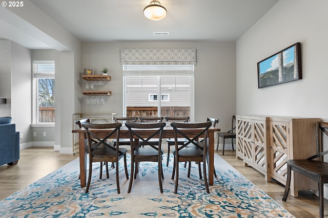 dining room featuring light wood-type flooring