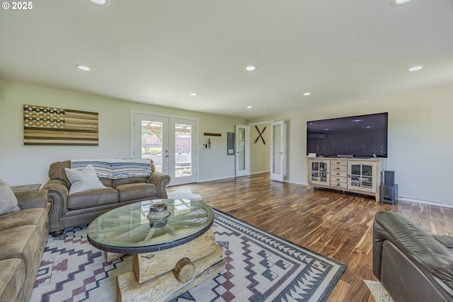 living room with recessed lighting, baseboards, and wood finished floors