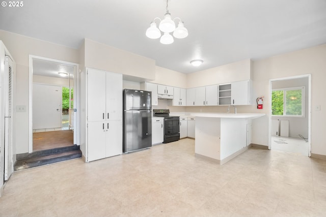 1339 SW 27th Ct, Gresham, OR 97080 - kitchen featuring black appliances, a chandelier, a peninsula, and plenty of natural light