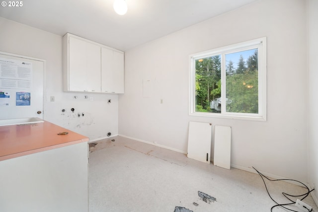 1339 SW 27th Ct, Gresham, OR 97080 - washroom featuring cabinet space, hookup for an electric dryer, and baseboards