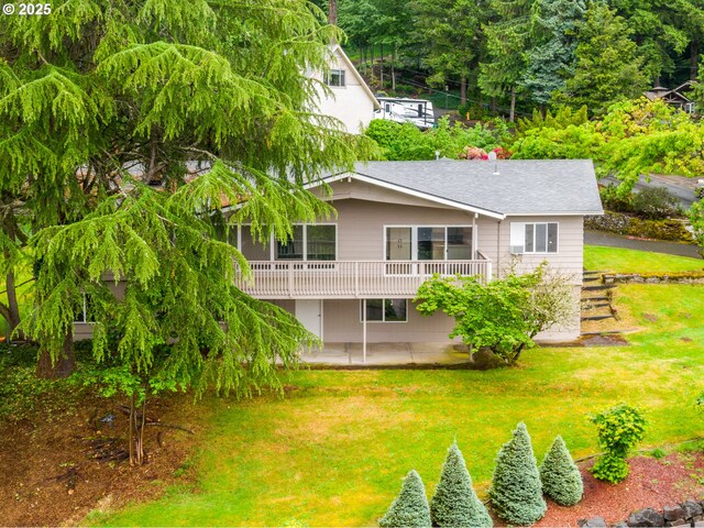 1339 SW 27th Ct, Gresham, OR 97080 - rear view of property featuring a patio area, a yard, a deck, and a shingled roof