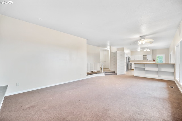 1339 SW 27th Ct, Gresham, OR 97080 - unfurnished living room with ceiling fan, carpet flooring, and baseboards