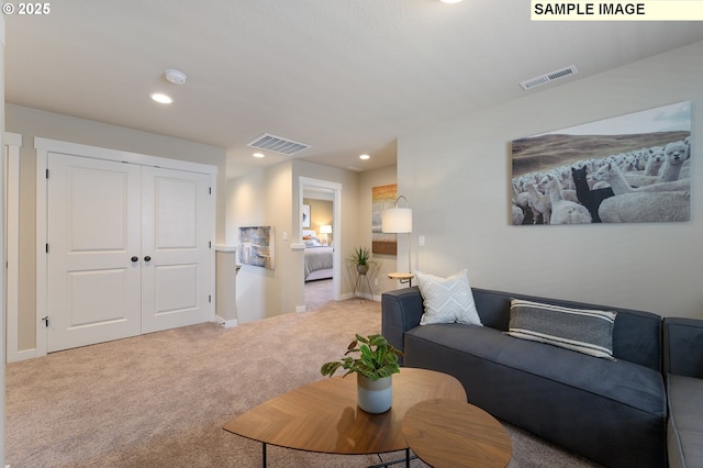 living room with carpet, recessed lighting, and baseboards