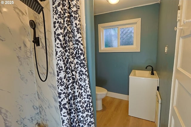929 S 7th St, Coos Bay, OR 97420 - full bathroom featuring toilet, a shower with shower curtain, wood finished floors, ornamental molding, and vanity