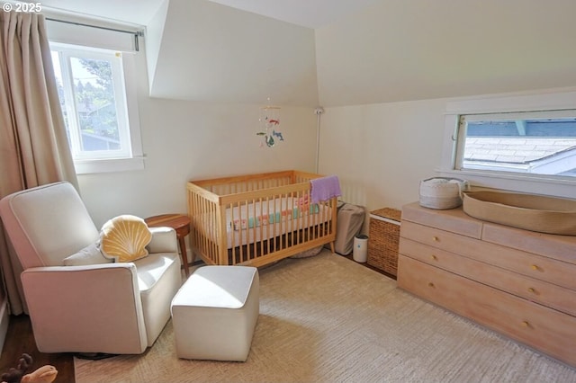 929 S 7th St, Coos Bay, OR 97420 - carpeted bedroom with multiple windows, a crib, and lofted ceiling