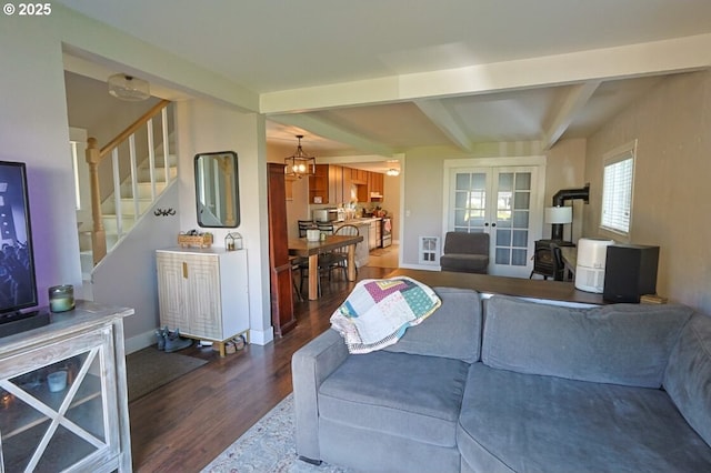 929 S 7th St, Coos Bay, OR 97420 - living area featuring dark wood finished floors, beamed ceiling, stairs, french doors, and baseboards