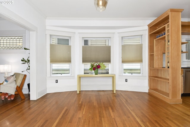 1330 SE 14th Ave SE, Portland, OR 97214 - detailed view of wood finished floors, baseboards, ornamental molding, and dishwasher
