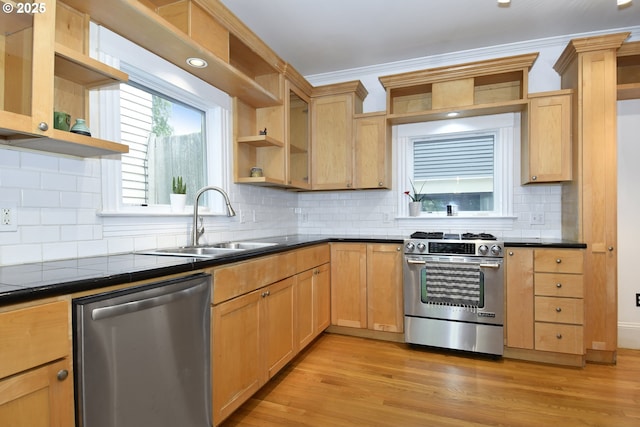 1330 SE 14th Ave SE, Portland, OR 97214 - kitchen featuring stainless steel appliances, open shelves, a sink, dark countertops, and tasteful backsplash