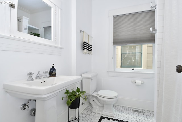1330 SE 14th Ave SE, Portland, OR 97214 - full bath featuring toilet, ornamental molding, a sink, and tile patterned floors