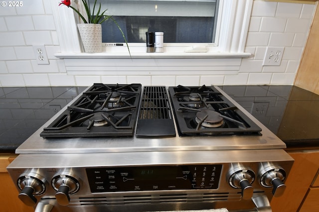 1330 SE 14th Ave SE, Portland, OR 97214 - kitchen view of stainless steel gas stove and tasteful backsplash