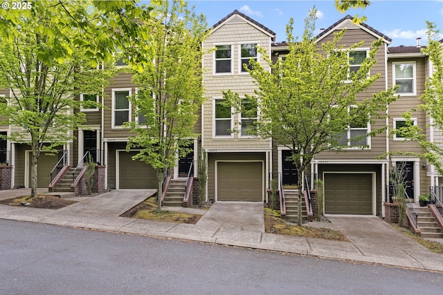 10275 NW Wilshire Ln, Portland, OR 97229 - view of property with stairway, a garage, and driveway