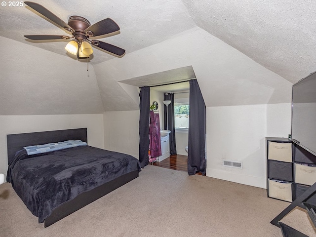 410 E Yacolt Rd, Yacolt, WA 98675 - carpeted bedroom with lofted ceiling, a textured ceiling, and a ceiling fan
