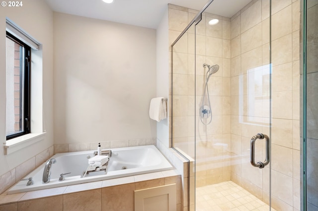 bathroom with independent shower and bath