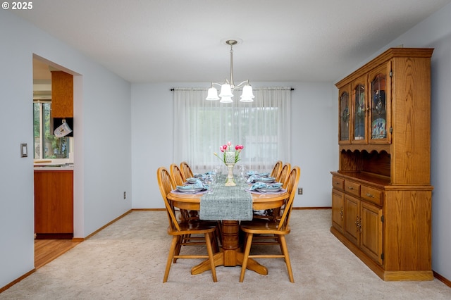 dining room featuring a notable chandelier