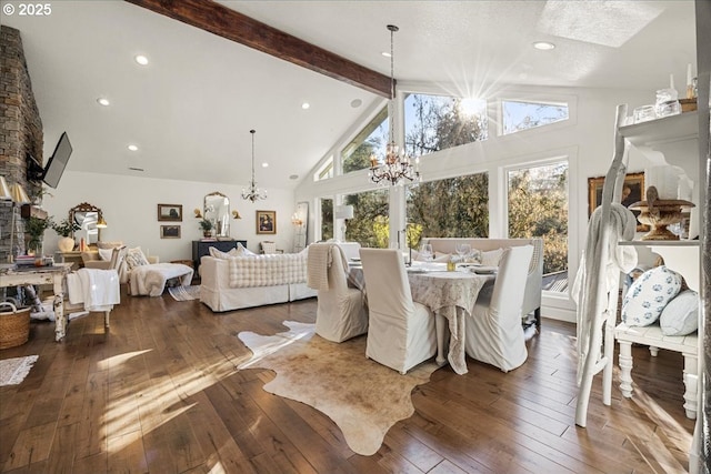 dining room with beamed ceiling, dark hardwood / wood-style flooring, high vaulted ceiling, and a chandelier