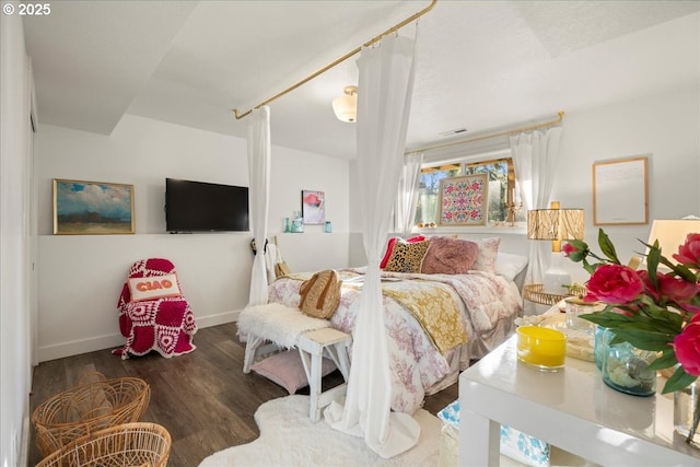 bedroom featuring dark hardwood / wood-style floors