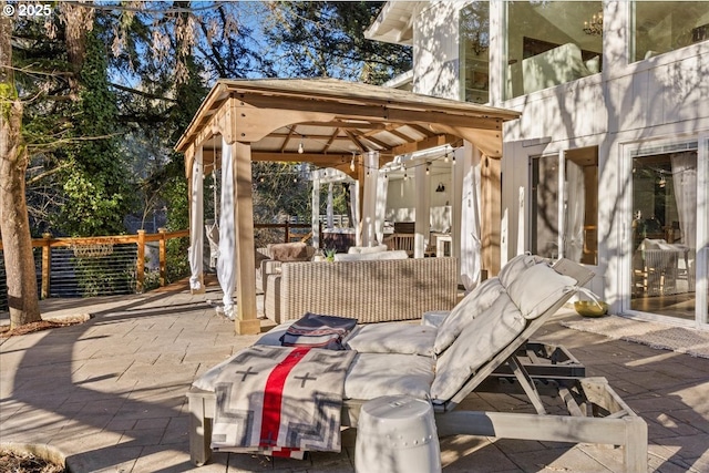 view of patio with a gazebo and an outdoor living space