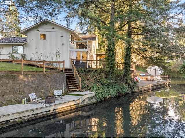 rear view of property with a deck