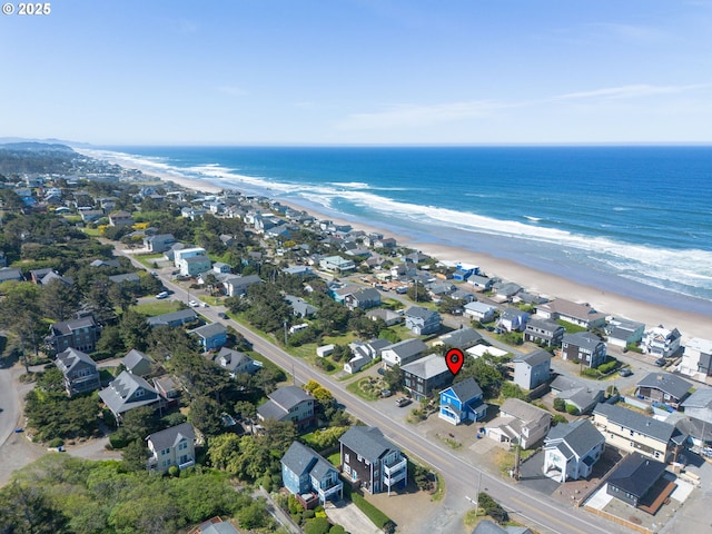 5769 NW Logan Rd, Lincoln City, OR 97367 - aerial view of property and surrounding area with extended coastline