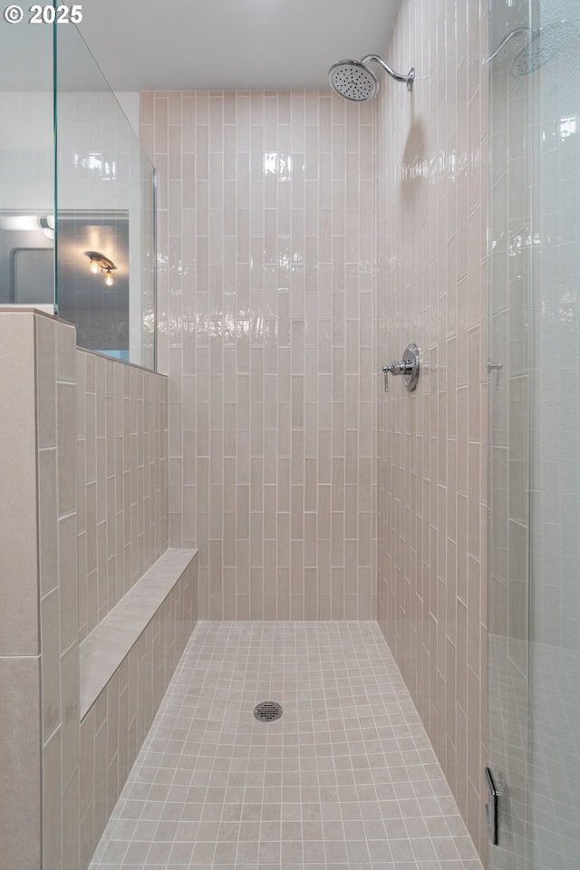 bathroom featuring a stall shower