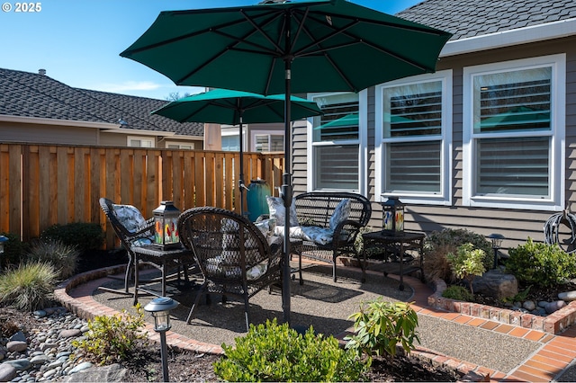 view of patio with fence