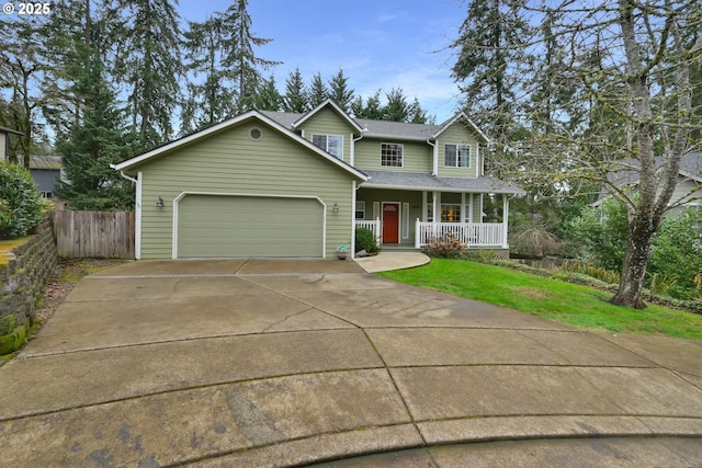 view of front of property featuring a garage, covered porch, and a front lawn