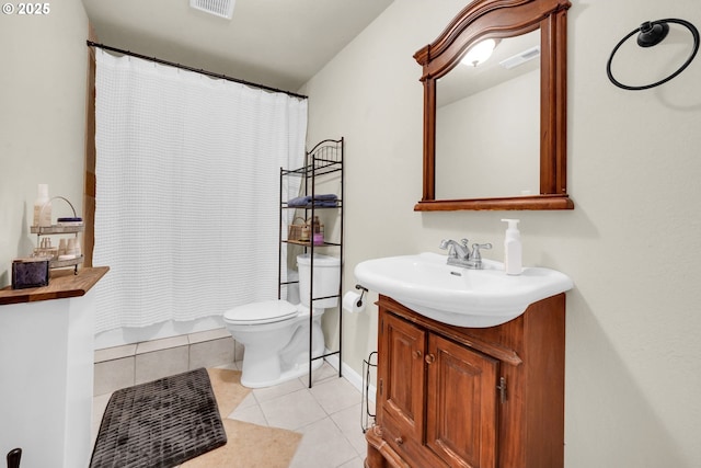 bathroom featuring a shower with curtain, tile patterned floors, toilet, and vanity