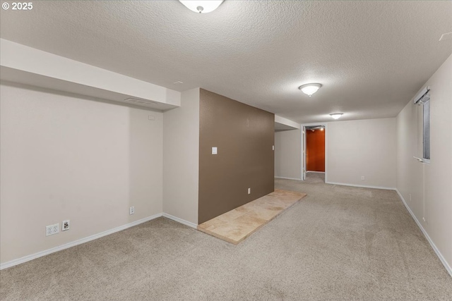 7406 N Fiske Ave, Portland, OR 97203 - finished basement with carpet floors and a textured ceiling