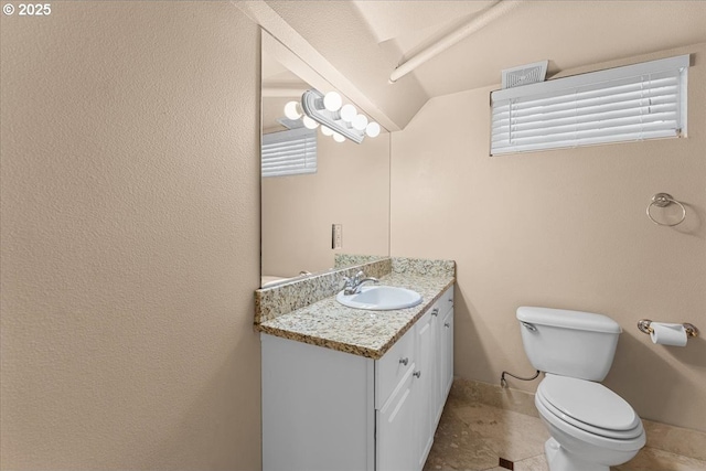 7406 N Fiske Ave, Portland, OR 97203 - half bathroom featuring vanity and vaulted ceiling