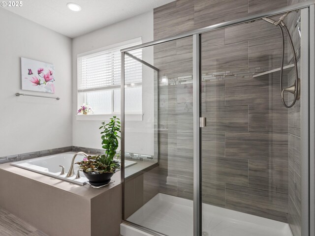 4745 S 19th St, Ridgefield, WA 98642 - full bathroom featuring recessed lighting, a garden tub, and a stall shower